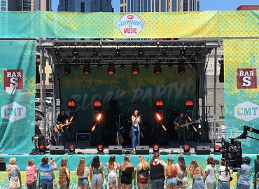 CMT concert stage outside with outdoor lighting