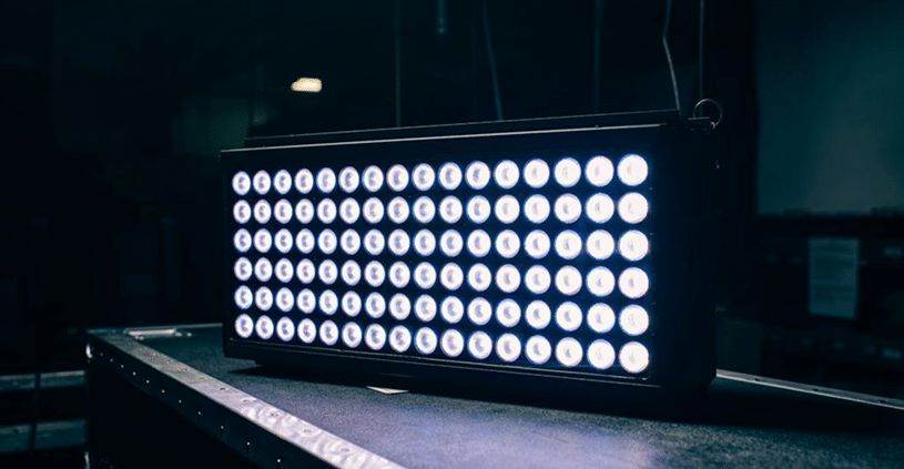 Professional LED panel array illuminating corporate event stage setup