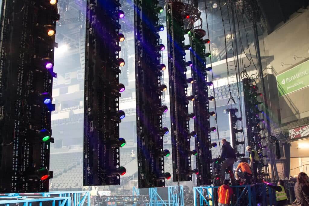 Stage rigging with multicolored LED lights for corporate event lighting production