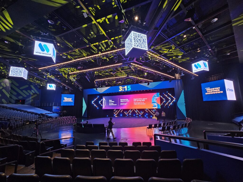 Elaborate LED display for conference presentation with bespoke LED cube screens