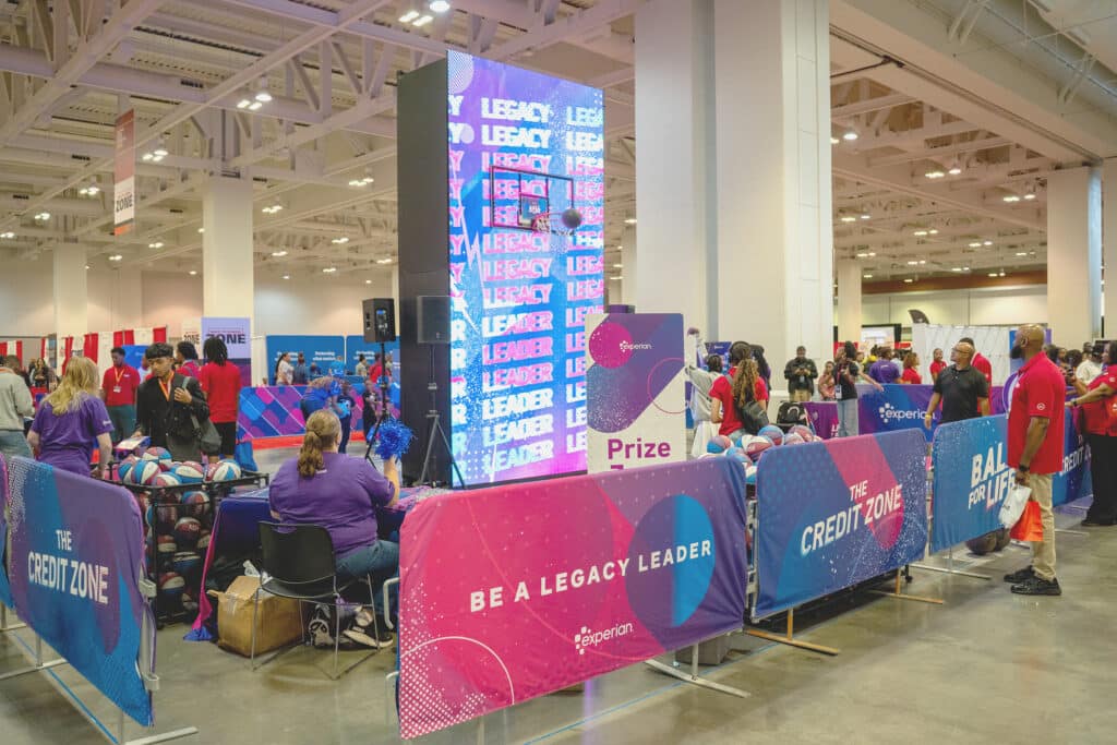 LED video wall anchors branded Experian basketball activation at a convention center fan event